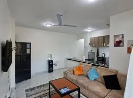 cozy 1bedroom mombasa bamburi near the beach with hot shower, Netflix, Secured parking