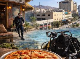Pizza Street Hostel, hotel en Áqaba