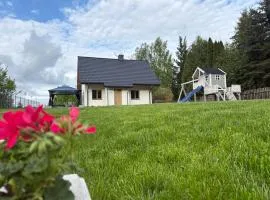 Nowy dom domek Sajzy 34 na Mazurach, balia ogrodowa z funkcją jacuzzi