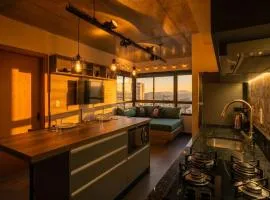 Lume 604 l Studio Industrial Completo com Vista l 5 min dos Vinhedos l Garagem Inclusa