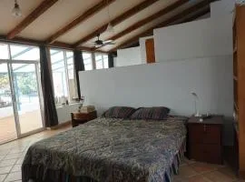 Large studio with private patio in Casa Cornucopia