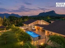 StayVista's The Tavern At Canary Farms - Mountain-View Luxury Mansion with Infinity Pool & Games Zone