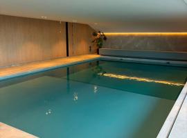 Vakantiestudio De Zeeparel De Panne met zwembad, hotel a De Panne