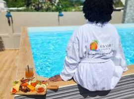 Évasion en Plein Cœur de Port-Louis T3 avec Piscine, Jacuzzis, Sauna, Tapas & Mocktails