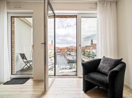 Möwe - Apartment in der Hafenresidenz mit Balkon & Wellness, hotel in Waren