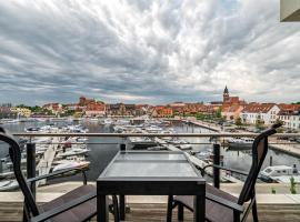 Wohlfühloase in der Hafenresidenz mit Balkon und Wellness, Hotel in Waren (Müritz)