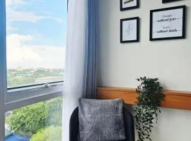 A Million Escape I 55" TV Queen Bed Studio - Sunrise Kasara Pasig