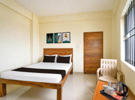 Hotel O Savi Rooms, hotel u gradu Gubbi