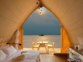 Reef Resort - Mount Apo View Unit B3, ξενοδοχείο σε Kaputian