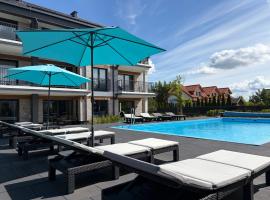 Inny Klimat – hotel w Rowach