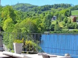 Seeblick-Ferienwohnung "Agger-Blick 2" mit traumhafter Terrasse, kostenlosen E-Bikes, Sauna & Kajak