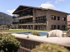 Suitehouse, Premium Apartments, Pools & Spa in Dolomites - by Familiaris