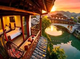Huaqianshu Theme Inn 高铁免费接站或送站一次