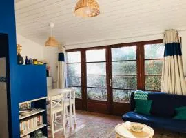 Wooden house, forest and sea