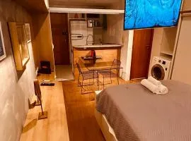 Flat Novo e Moderno a 200m do Shopping , com Piscina wifii 500mbps
