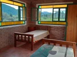 Habitación doble entre naturaleza y arte en Cabana