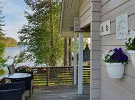 Villa Salme lemmikkiystävällinen mökki Taivalkoskella Jokijärven rannalla