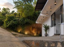 Birdwing Cottage, Munnar, hótel í Munnar