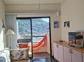 Guarujá Enseada,2 quartos, ar, vaga 1 carro, praia à pé