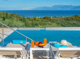 Family Villa Portes with panoramic view!، فندق في Píthos