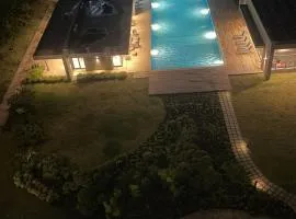 Spacious 2-Bedroom Family Suite with Pool & Garden View