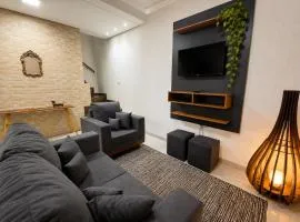 Sobrado central | Ar, 4 camas, Wi-Fi 800Mb