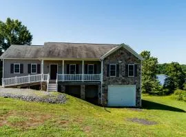 Two-story, lakefront getaway with dock, beach, grill, 2 kayaks, 2 canoes, AC