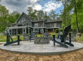 Sprawling waterfront home with kayaks, game room, and hot tub