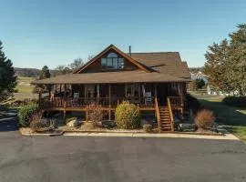 Dog-friendly, lake view cabin w/ furnished decks, Ping-Pong & darts