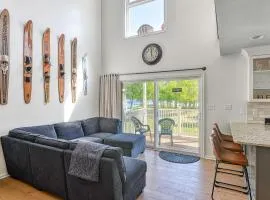 Three-story lakefront home w/ covered boat slip, and tennis/pickleball access