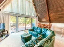 Charming, lakefront A-frame with private dock, lakeside gazebo, spacious deck