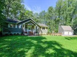 Lakefront home with deck, hot tub, game room, kayaks, & fireplace