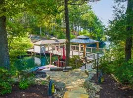 Lakefront home with granite counters, fireplace, lake views, & dock