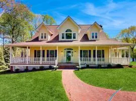 Lakefront home with private dock, kayaks, beach, badminton, firepit, & deck