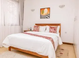 Maskani I - 2BR, Fast Wi-Fi, GenSet, Workspace, Secure Gated Estate, 5mins to Beach
