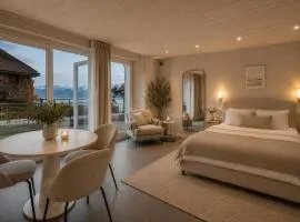 Perched above Montreux, with breathtaking views of Lake Geneva and the Alps