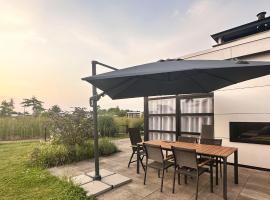 Marina Strandbad Chalet Inselperle mit Zaun & AirCo Nr 84, hotel a Olburgen