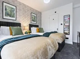 Elegant 4 Bed Home with Parking & Garden Near City Centre