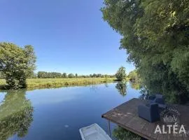 Private riverside villa with garden sleeps 8