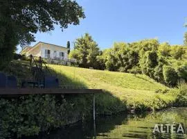 Private riverside villa with garden sleeps 8