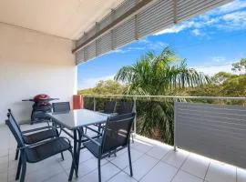 Tropical Breeze - Poolside Stay near the Waterfront