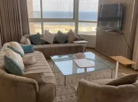 Apartment overlooking the sea in Al-Masarat Tower