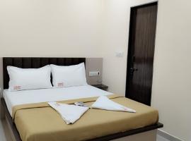 Elegant Inn Hotel, hotel en Surat