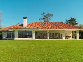 Maravillosa casa con porche y jardín