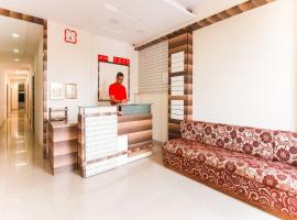 Hotel O Unique Inn, hotell i Dhule