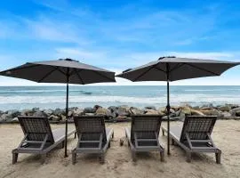 Oceanside duplex with private beach and fire pit