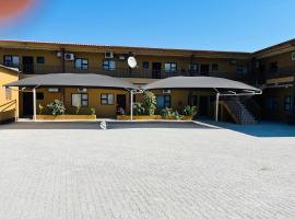 Otam-Check Guest House, hotel v Ondangwě