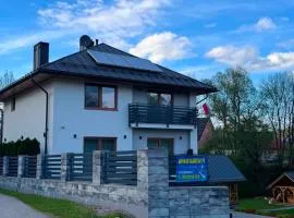 Apartamenty Nad Rzeką z balią