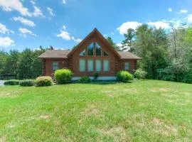 Three-story dog-friendly home with large deck, wood swing, firepit, lawn, & more