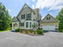 Lakefront home with private beach, dock, deck, kayaks, game room, & fireplace